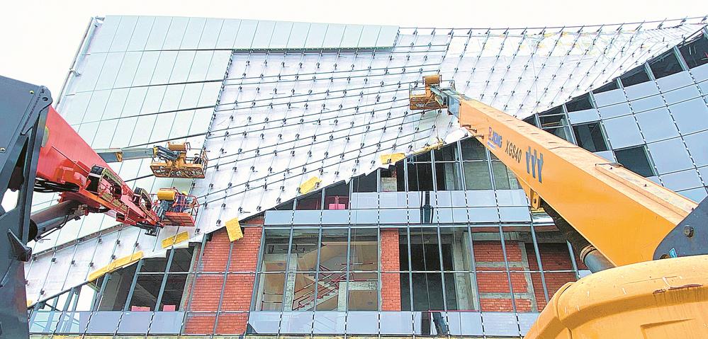 九游官网入口：创新突破！山东建工集团可调节幕墙专利引领建筑新风尚
