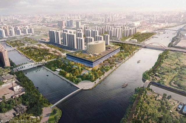 九游体育:“水波涟漪”映照千年运河 京杭大运河博物院琉璃幕墙营造“悬浮”美学